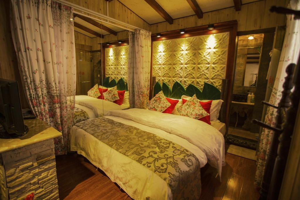 Secret Garden Hotell Lijiang  Rom bilde