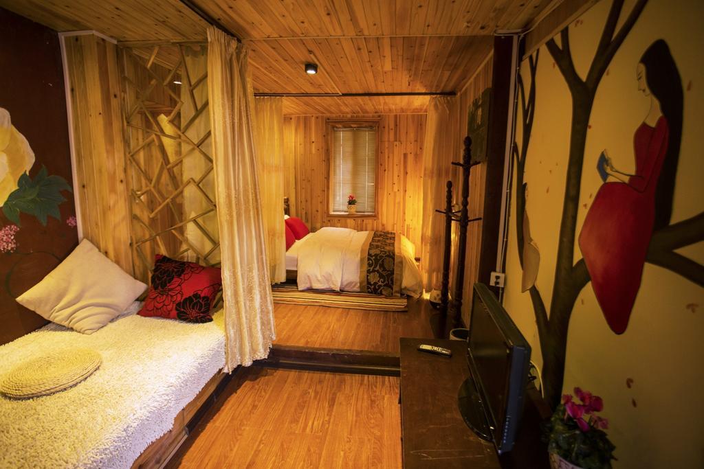 Secret Garden Hotell Lijiang  Rom bilde