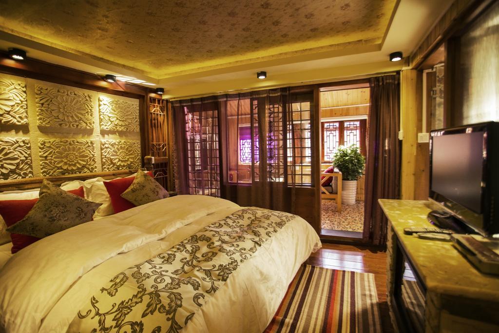Secret Garden Hotell Lijiang  Rom bilde