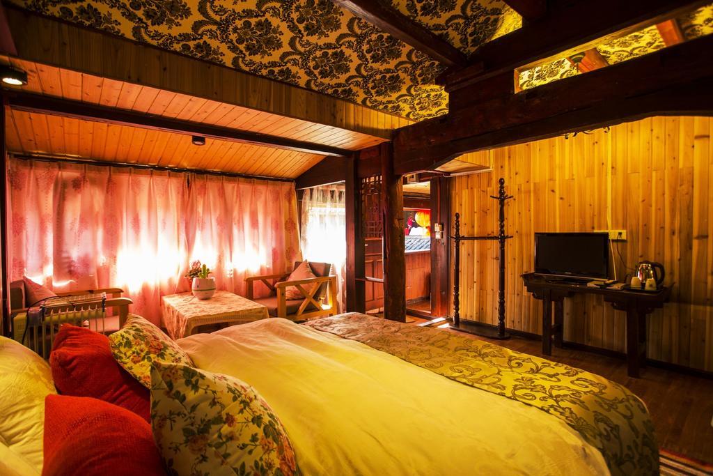 Secret Garden Hotell Lijiang  Rom bilde