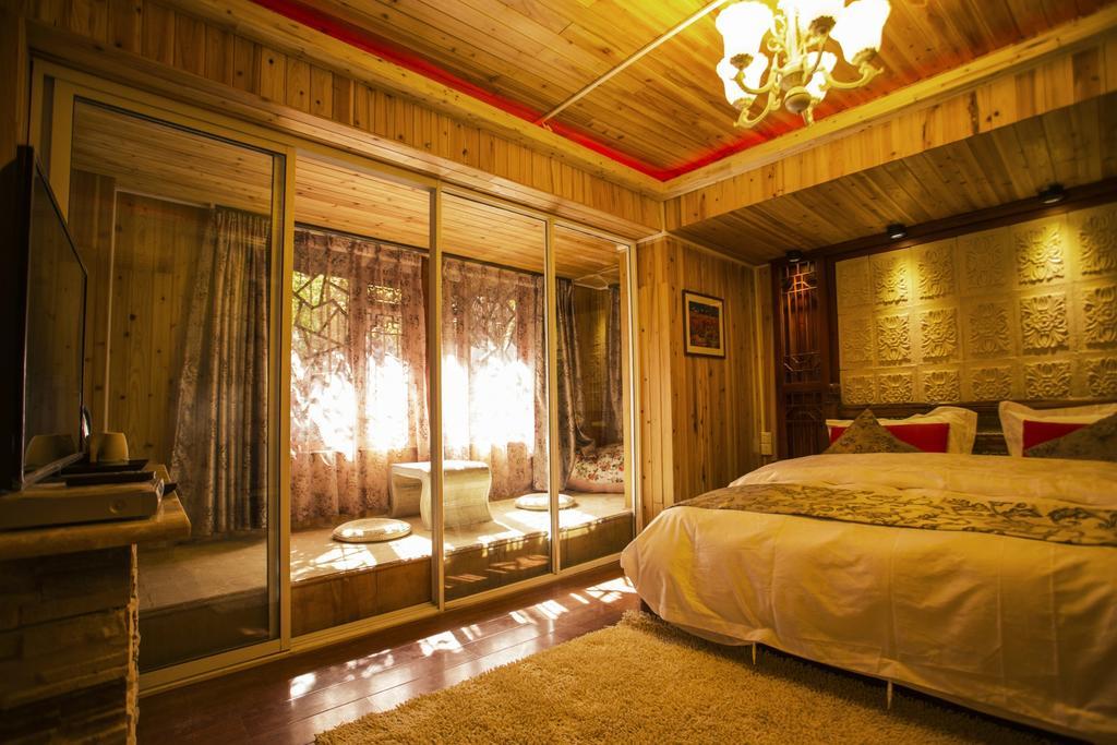 Secret Garden Hotell Lijiang  Rom bilde