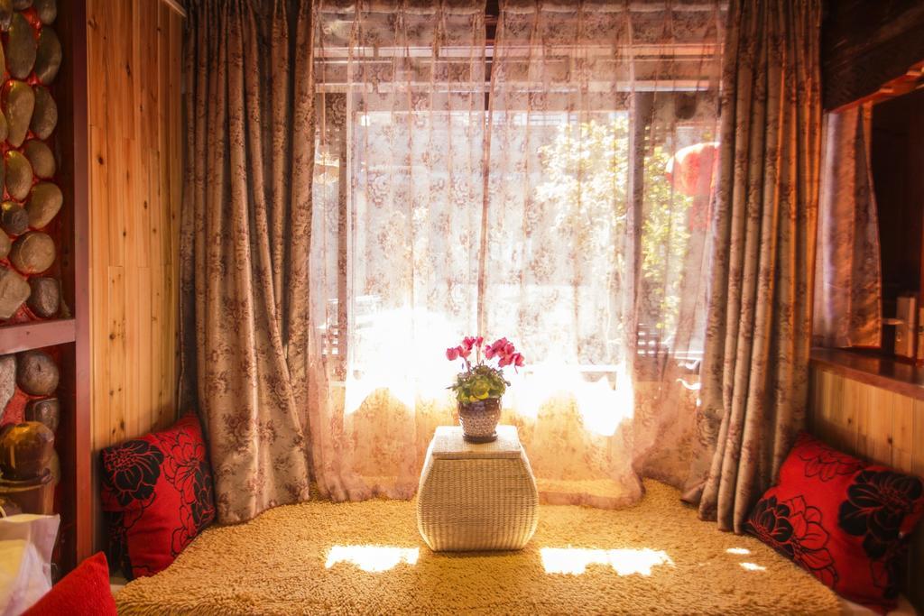 Secret Garden Hotell Lijiang  Rom bilde