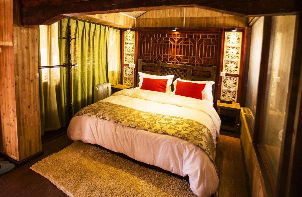 Secret Garden Hotell Lijiang  Rom bilde