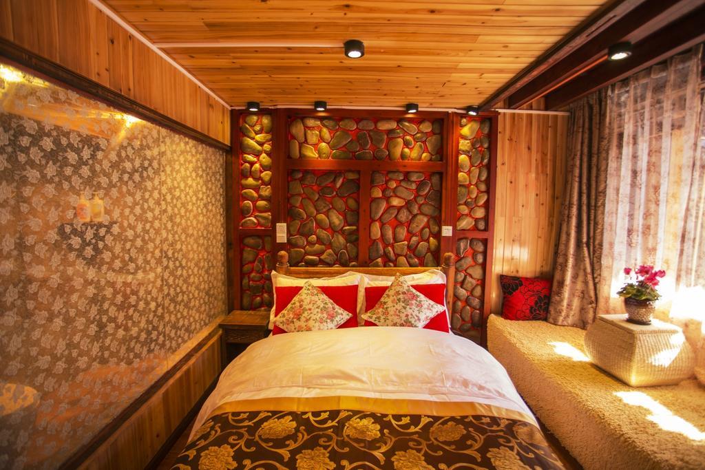 Secret Garden Hotell Lijiang  Rom bilde