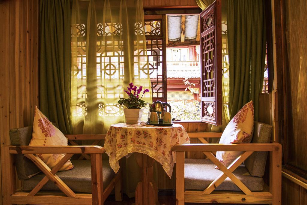Secret Garden Hotell Lijiang  Rom bilde