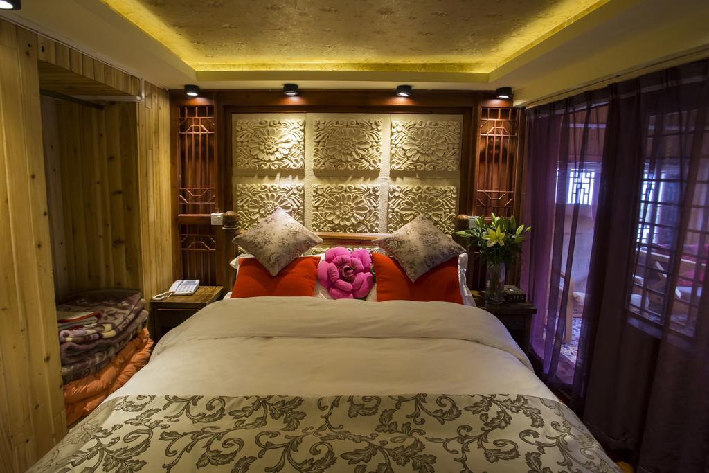 Secret Garden Hotell Lijiang  Rom bilde